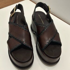 A pair of platform Loeffler Randall sandals.